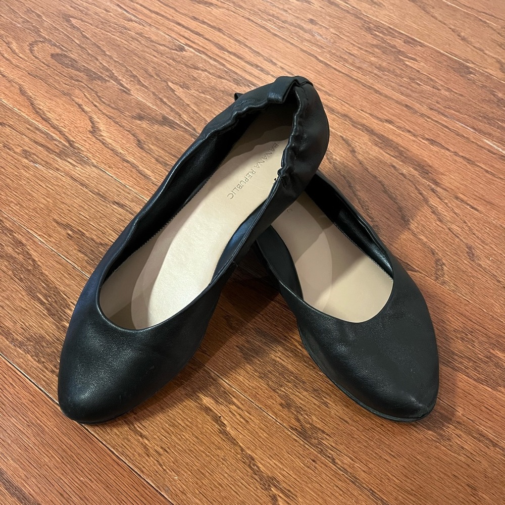 Black leather ballet flats